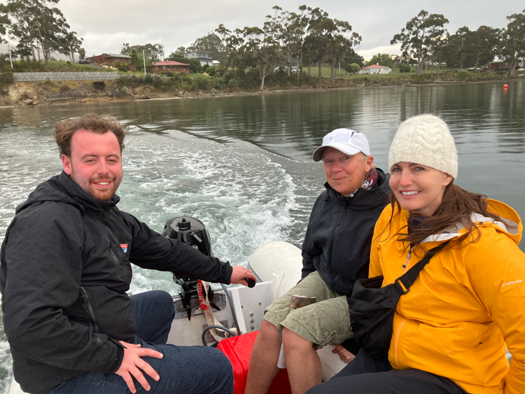 John Ange and Mish in the dinghy on the way back to Deephole Bay from Southport