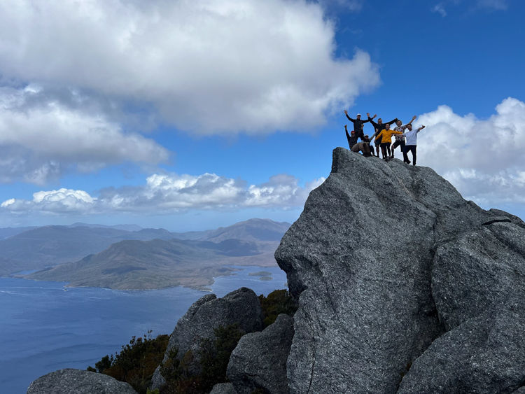 The crew of Silver Fern at the summit of Mount Rugby