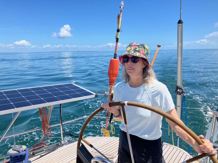 Bronwyn at the helm in Moreton Bay